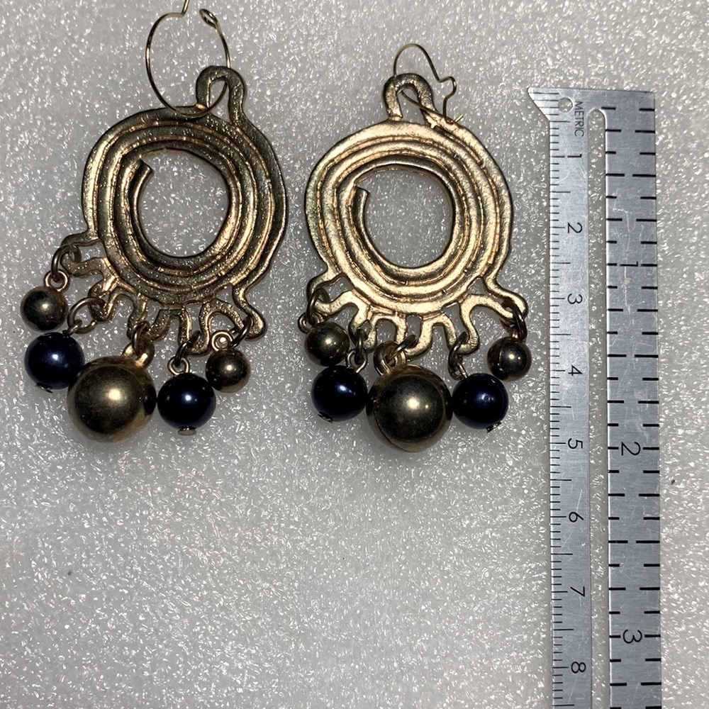 Gold spiral and dangled bead earrings